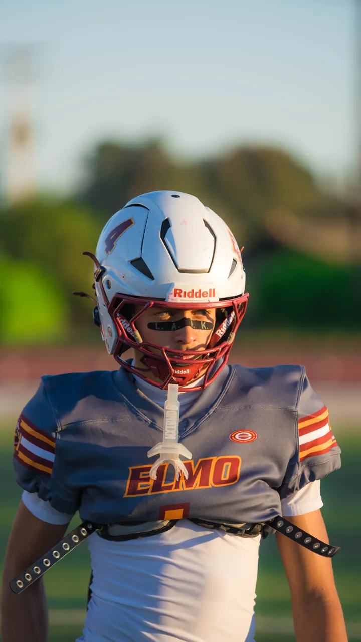 El Modena player portrait in helmet and jersey